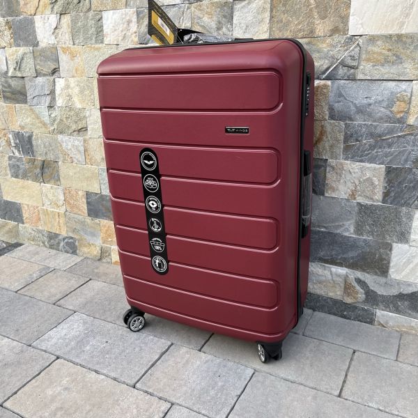 Чемодан дорожный большой из полипропилена Wings DQ181-03 L Бордовый