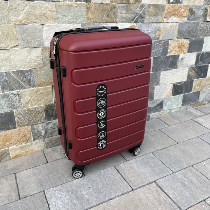 Валіза дорожня середня з поліпропілену Wings DQ181-03 M Бордовий