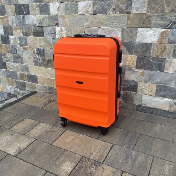 Чемодан дорожный средний Wings AT01 M Оранжевый