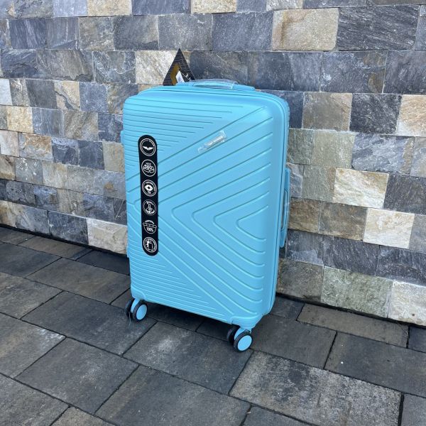 Чемодан дорожный средний из полипропилена Wings DQ181-05 M Голубой (Macaron blue)