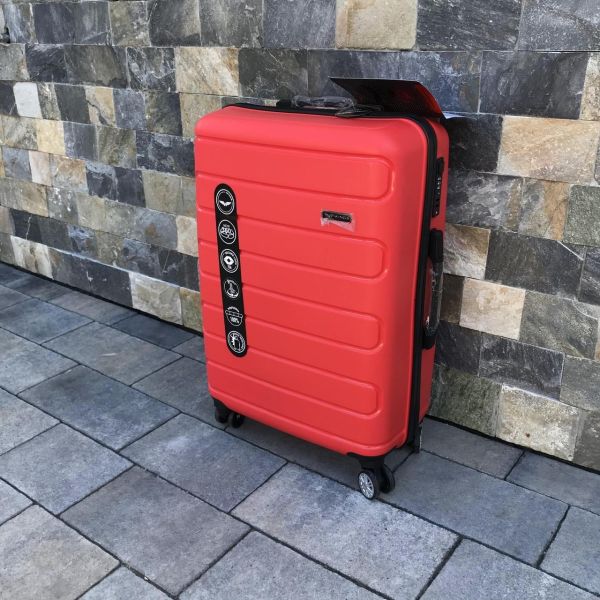 Чемодан дорожный средний из полипропилена Wings DQ181-03 M Красный