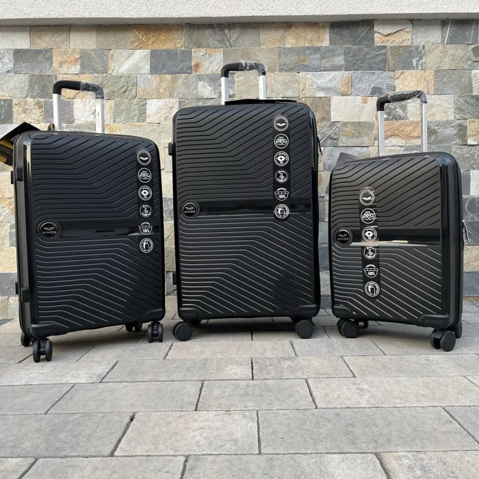 Чемодан дорожный большой из полипропилена Wings DQ181-04 L Черный