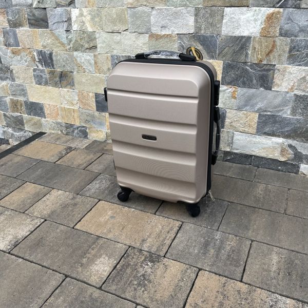 Чемодан дорожный малый Wings AT01 S Шампань